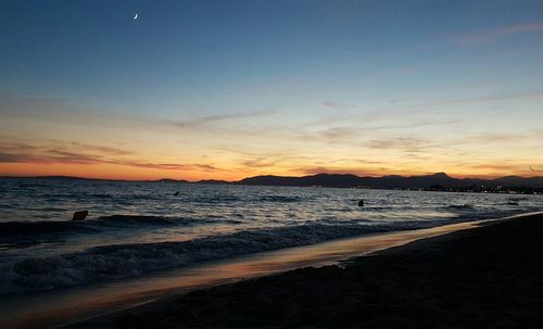 Scenic view of beach during sunset