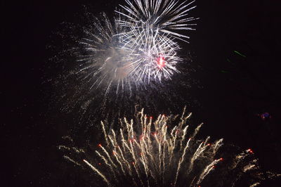 Firework display at night