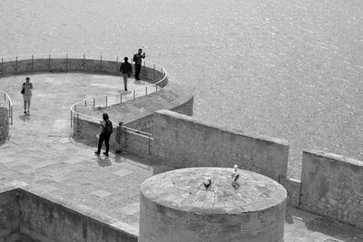 High angle view of people on the wall