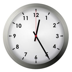 Low angle view of clock against white background