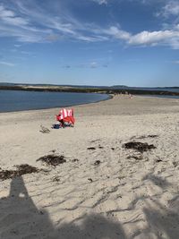 Scenic view of beach against sky