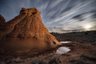 Red sandstone rock formation in remote arizona desert under a st