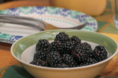 Close-up of fruits in bowl on table