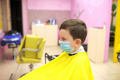 Full length rear view of boy