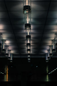 Low angle view of illuminated ceiling