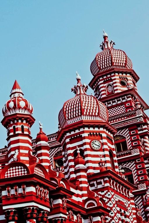 architecture, built structure, building exterior, building, sky, low angle view, clear sky, religion, place of worship, no people, belief, nature, red, the past, day, history, spirituality, outdoors, travel destinations, city, ornate, spire, roof tile