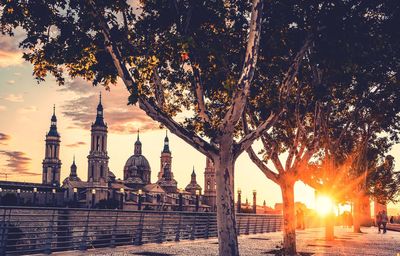 View of illuminated city at sunset