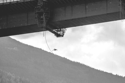 Low angle view of bungee jumping