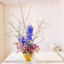 Flower vase on table