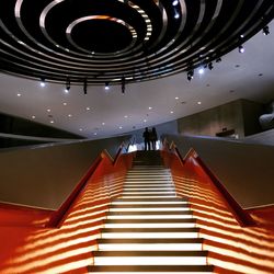 Low angle view of illuminated staircase at night