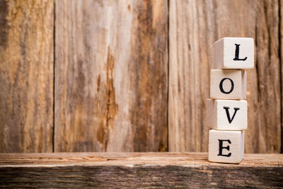 Close-up of wooden blocks on wood