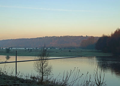 Scenic view of lake during sunset