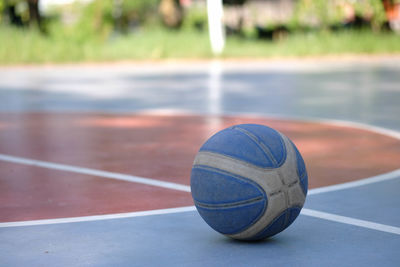 Close-up of soccer ball on field