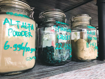 Close-up of glass jar on table