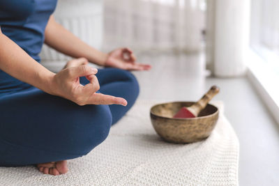 Midsection of woman preparing food