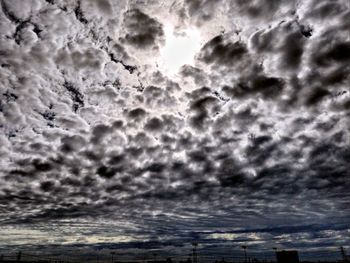 Low angle view of cloudy sky during sunset