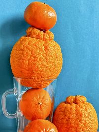 Close-up of orange fruit on table