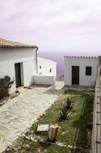 Houses and buildings against sky