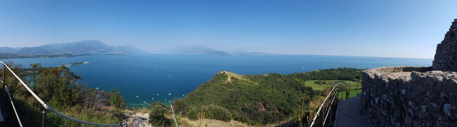 High angle view of bay against blue sky