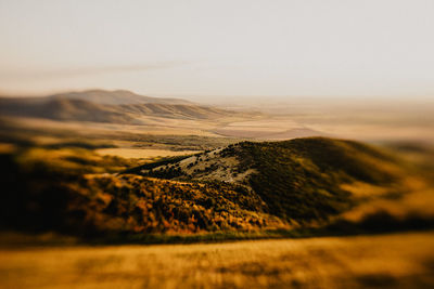 Scenic view of landscape against sky during sunset