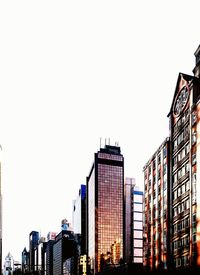 Low angle view of buildings against clear sky