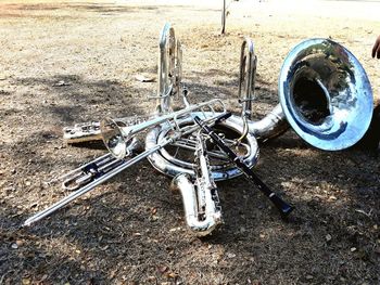 High angle view of abandoned bicycle on field