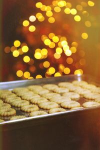 Close-up of illuminated christmas lights on table