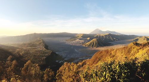 Panoramic view of landscape against cloudy sky