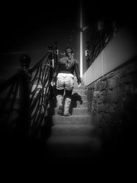 Full length of woman at night