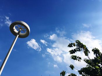 Low angle view of street light against sky