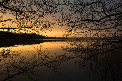 Sunset at lake knudsø outside ry, denmark