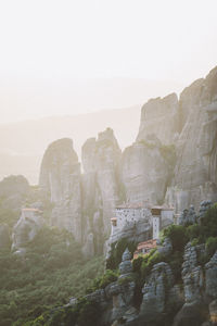 Scenic view of mountain against cloudy sky