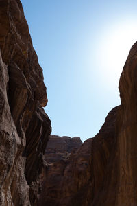 Low angle view of rock formation against clear sky