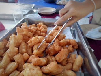 Close-up of man preparing food