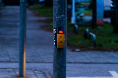 Close-up of pedestrian cross signal request device 