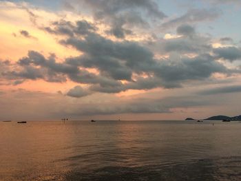 Scenic view of sea against sky at sunset