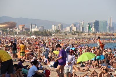 Crowded beach in city