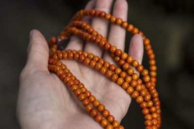Close-up of hand holding ice cream