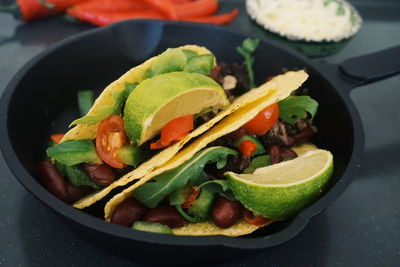 High angle view of salad in pan on table