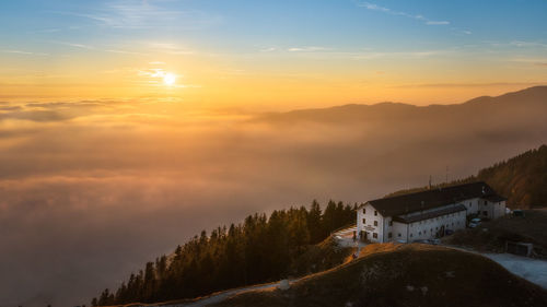 Scenic view of mountains against sky during sunset