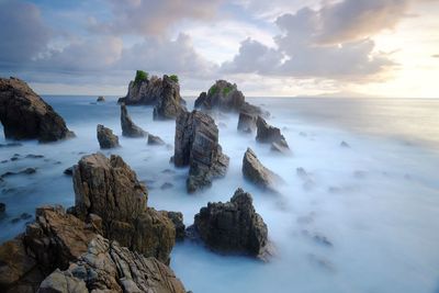 Panoramic view of sea against sky during sunset