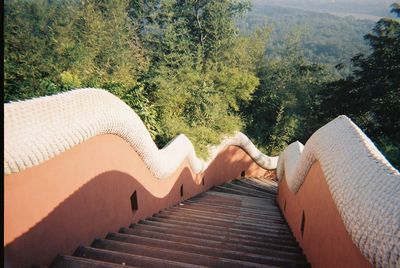 Low section of woman lying down on land