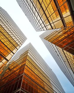 Low angle view of modern buildings against sky