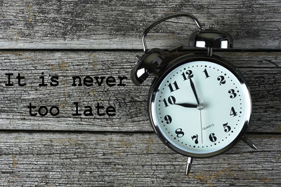 Close-up of clock on table