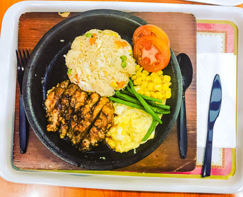 High angle view of breakfast served on table