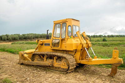 View of construction site on field against sky