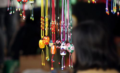 Close-up of illuminated decorations in market for sale