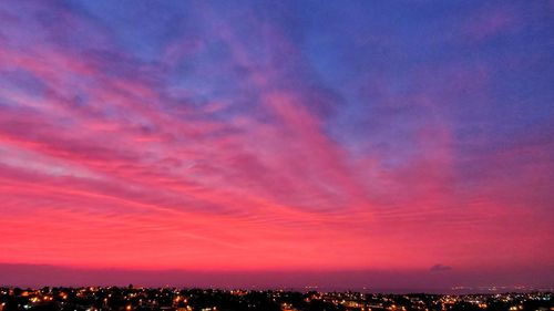 Scenic view of dramatic sky during sunset