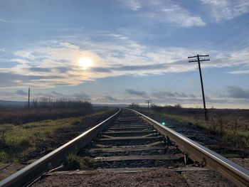 Railroad tracks against sky