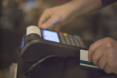 Close-up of person using mobile phone